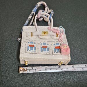 Tiny purse bag charm with baby labubu charm